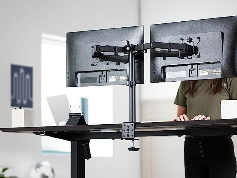 Back view of the central pole and articulating arms of the Orgemy 2 monitor mount with cable clips.