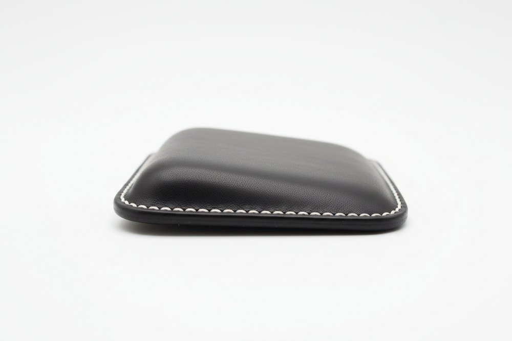 Orgemy leather mouse wrist rest side profile showing slim memory foam form